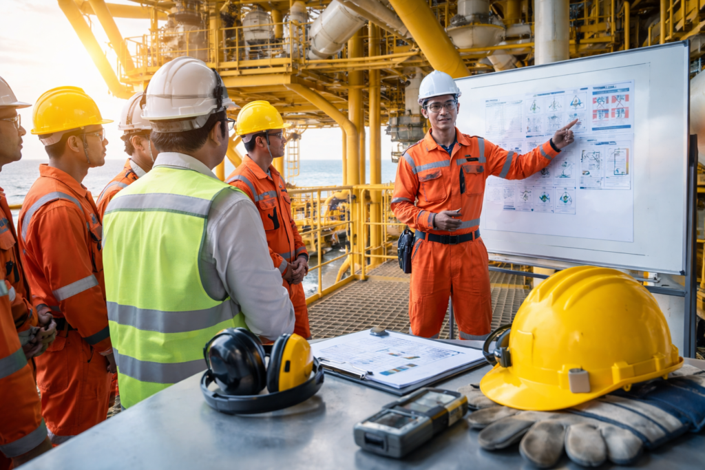 Offshore safety meeting at sunset